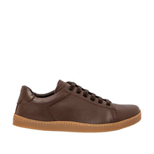 profile view of minimal brown leather sneaker with elastic laces 