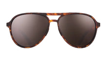 Sunglasses with tortoiseshell frame and dark lenses 